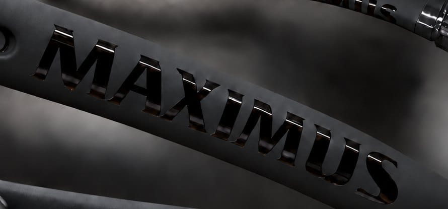Gloss black MAXIMUS lettering on a matte black frame